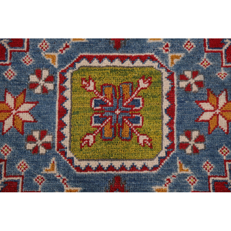 Tapis rouge à motif oriental Kazak
