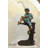 Boy Sitting on a Tree and Fishing Bronze Statue -  Size: 34"L x 28"W x 64"H. 
