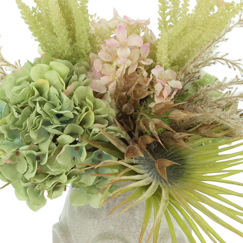Hydrangea and Palm Leaf in a Ceramic Vase