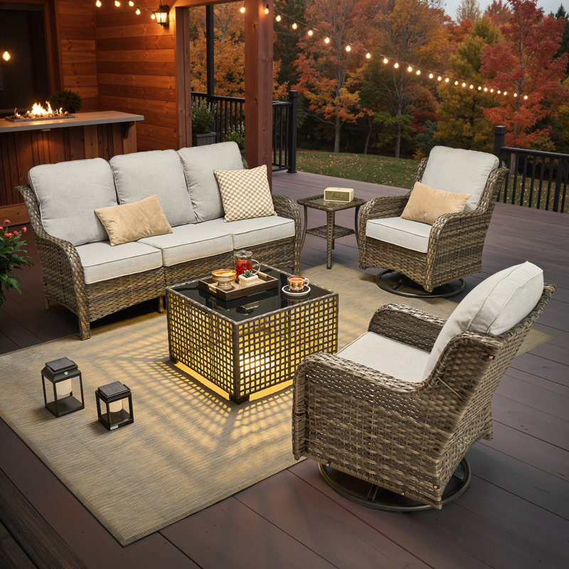 Ensemble de meubles de patio en osier toutes saisons 6 pièces Cracraft avec chaises berçantes pivotantes, canapé à assise profonde et table basse illuminée pour les soirées de jardin, de patio et de piscine