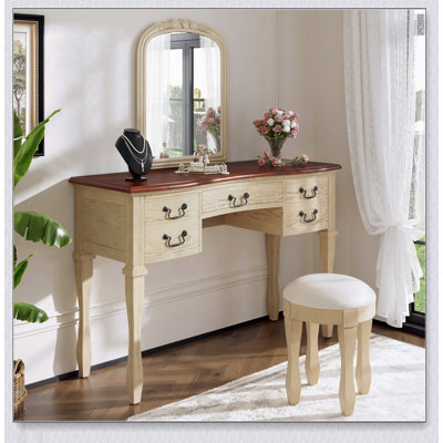 Coiffeuse de maquillage 46 po avec miroir à cadre floral incurvé, coiffeuse élégante avec 5 tiroirs et tabouret en cuir, pieds en bois massif et poignées antiques pour la chambre à coucher