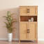 Armoire de rangement Corbisez avec portes en rotin tissé et tablettes réglables