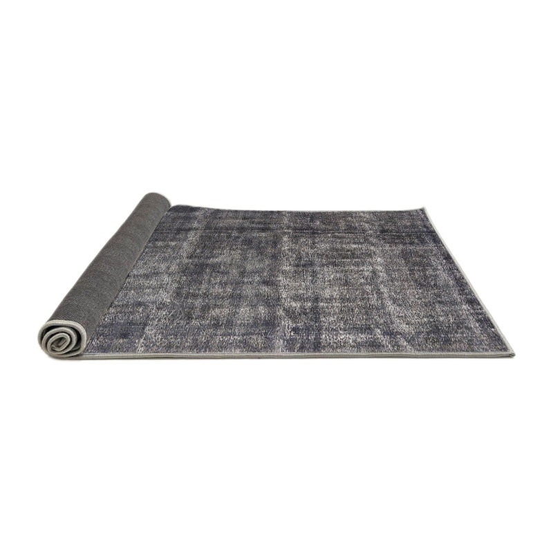 Tapis noir, Rond 5 pi
