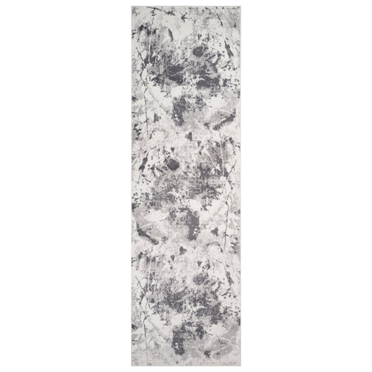 Mackensy Abstract Ivory Power-Loom Area Rug