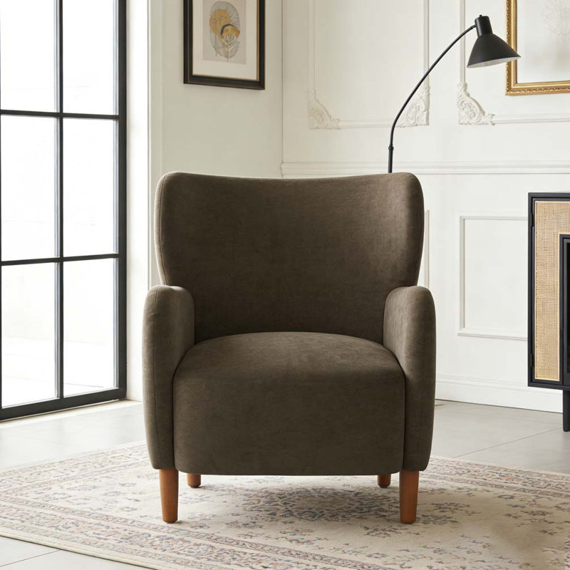 Fauteuil club rembourré à oreilles