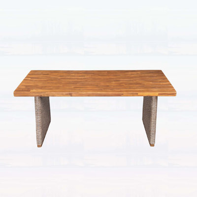 Durable Outdoor Acacia Wood Dining Table with Teak Finish and Brown Wicker Legs, Perfect for Elegant Al Fresco Meals.