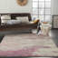 Tapis ivoire / rose à motif abstrait Adrieonna-592528140