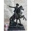 Statue de bronze d'un cowboy de l'Ouest