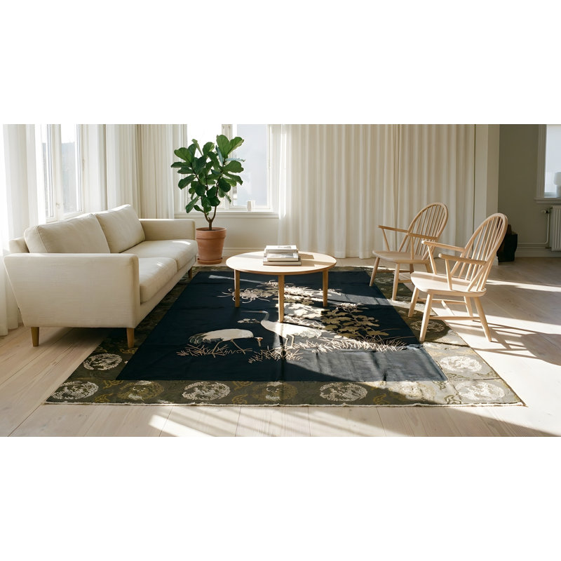Tapis noué à motif floral antique