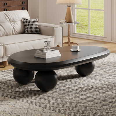 Khattab 51.2" Modern Three Legged Solid Wood Coffee Table by Ivy Bronx
