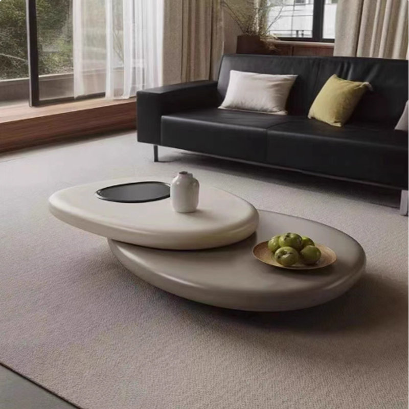 Table basse pivotante en forme de galet Creative
