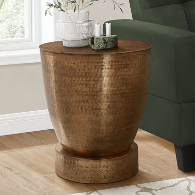 Table d'appoint cylindrique en métal cuivré pour le salon et la chambre à coucher, design contemporain avec finition martelée, utilisation polyvalente sur une table d'appoint ou une table de chevet