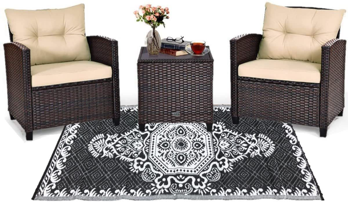 https://assets.wfcdn.com/im/02952806/compr-r85/2119/211971539/outdoor-plastic-straw-rug-patio-camping-reversible-mats-3ft-x-6ft-249-black-white.jpg