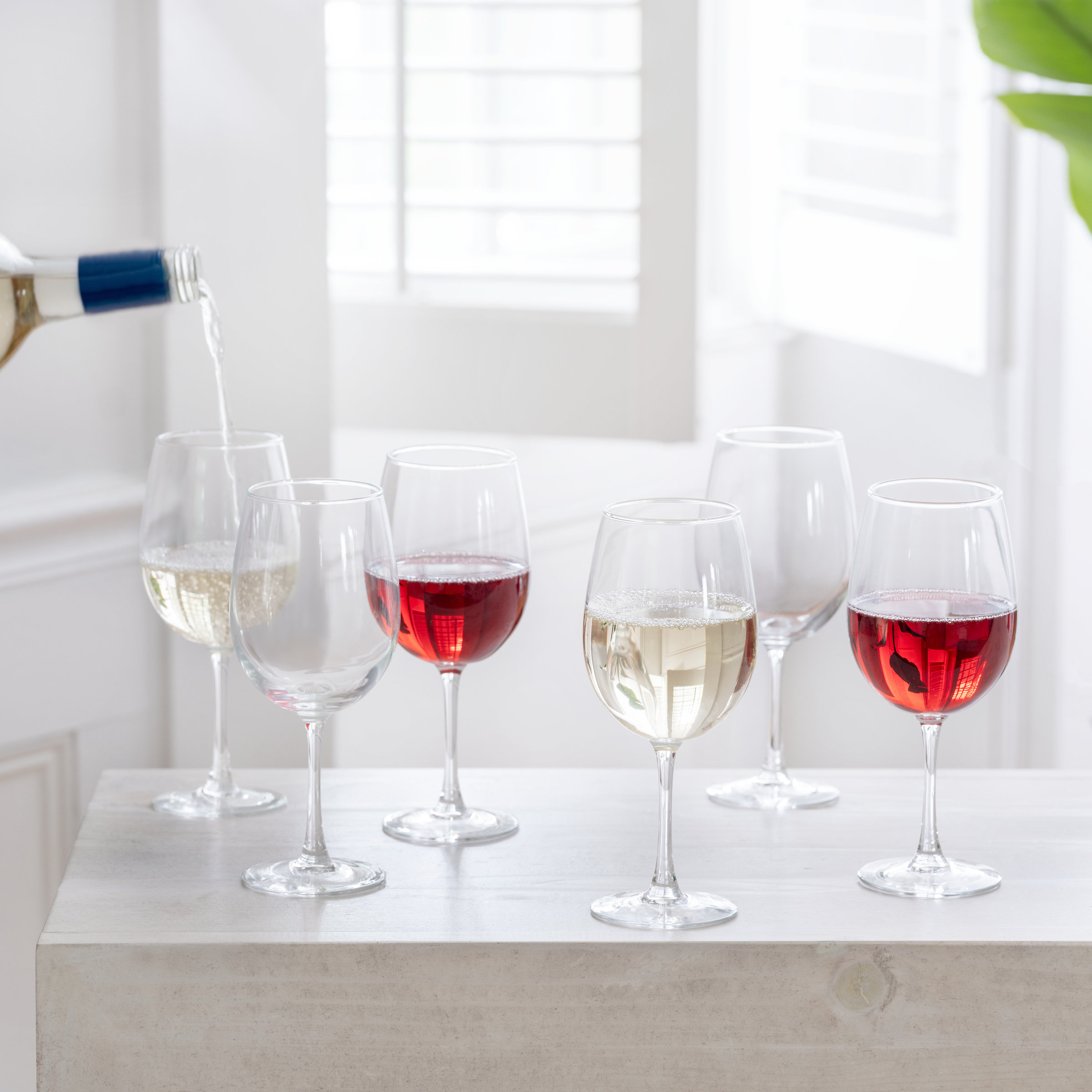 https://assets.wfcdn.com/im/02953154/compr-r85/2271/227153417/wayfair-basics-stemmed-12-oz-all-purpose-wine-glass.jpg