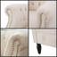 Élégant fauteuil club en tissu beige Akira avec dossier capitonné et accoudoirs cloutés-113569579