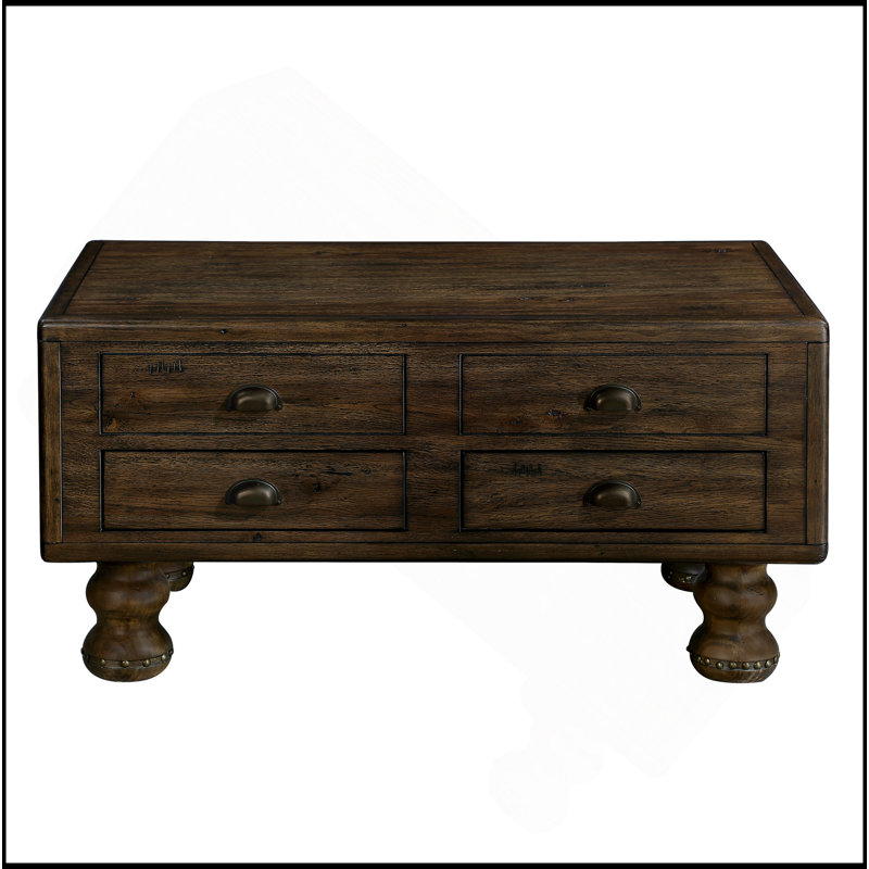 Table basse rectangulaire en bois massif exquis avec 4 tiroirs et pieds décoratifs à rivets, idéale pour divers espaces.
