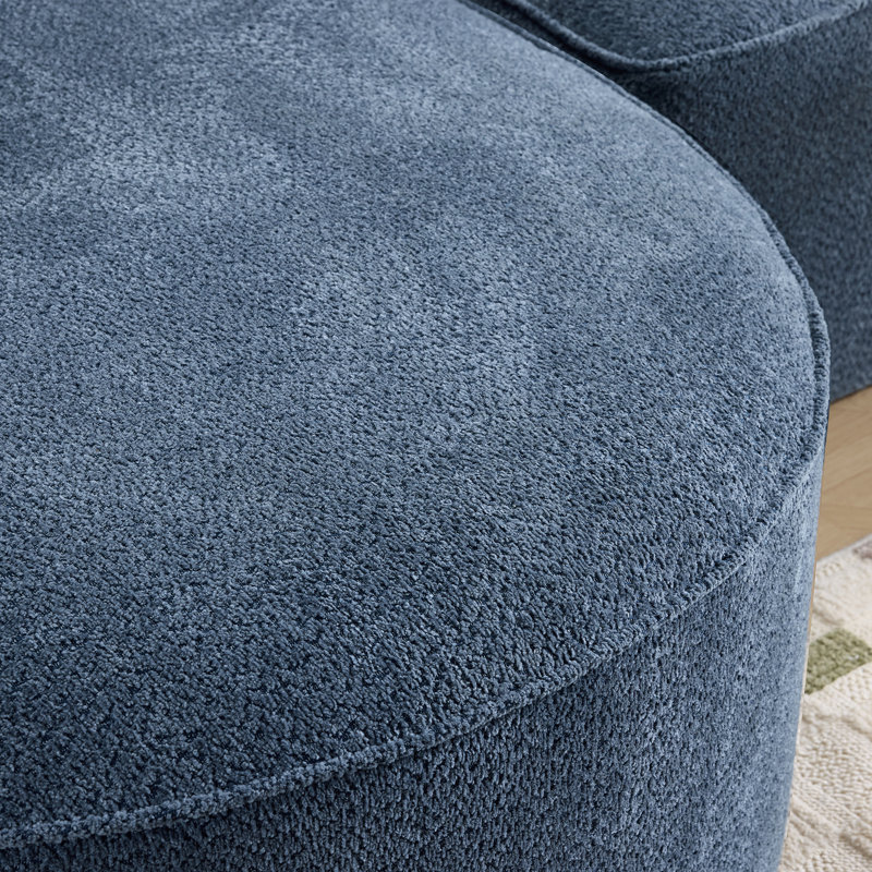 Canapé spacieux en chenille bleue, design moderne et confortable pour la maison