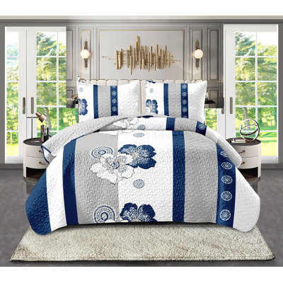 Ensemble de literie pour grand lit 4 pièces à motif floral bleu marine (grand / très grand / très grand californien) - courtepointe en microfibre matelassée + taies décoratives + drap-housse