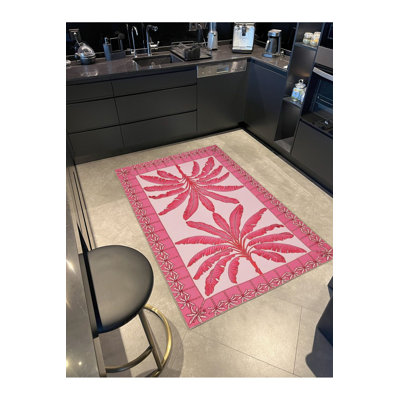 Tapis rose lavable à la machine