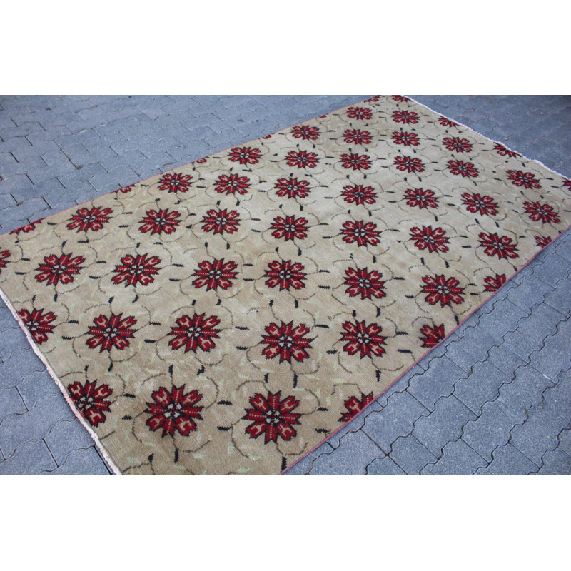 Tapis turc rétro à motif floral dans des tons riches, idéal pour la maison et le bureau