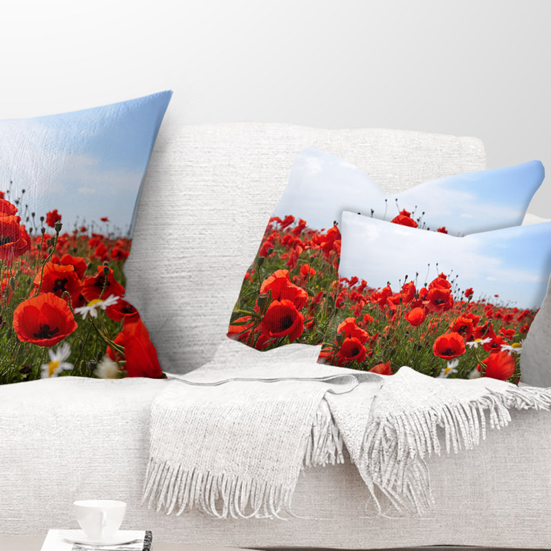 Coussins rouges sous un ciel bleu vif - Coussin décoratif à imprimé floral