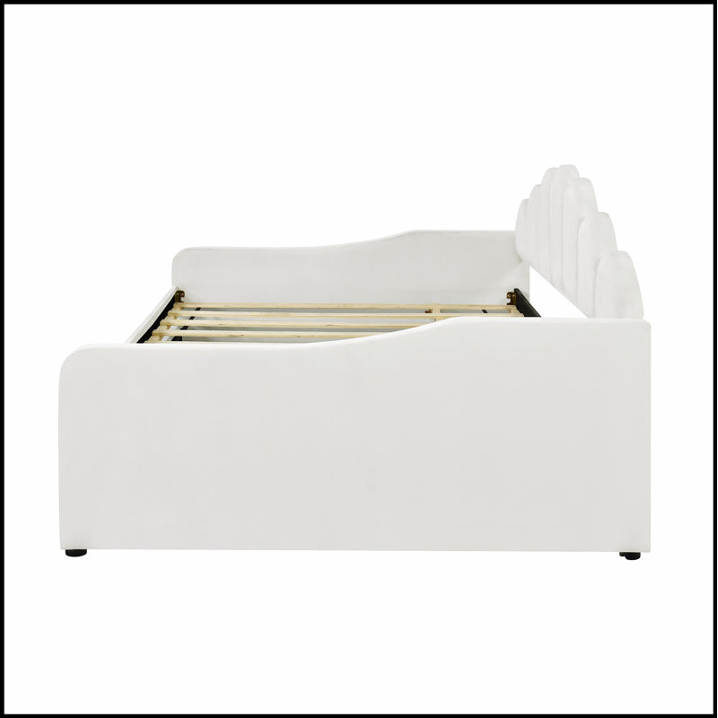 Structure de lit de jour rembourré avec dossier en forme de coquillage et lit gigogne, parfait pour un hôtel élégant et confortable