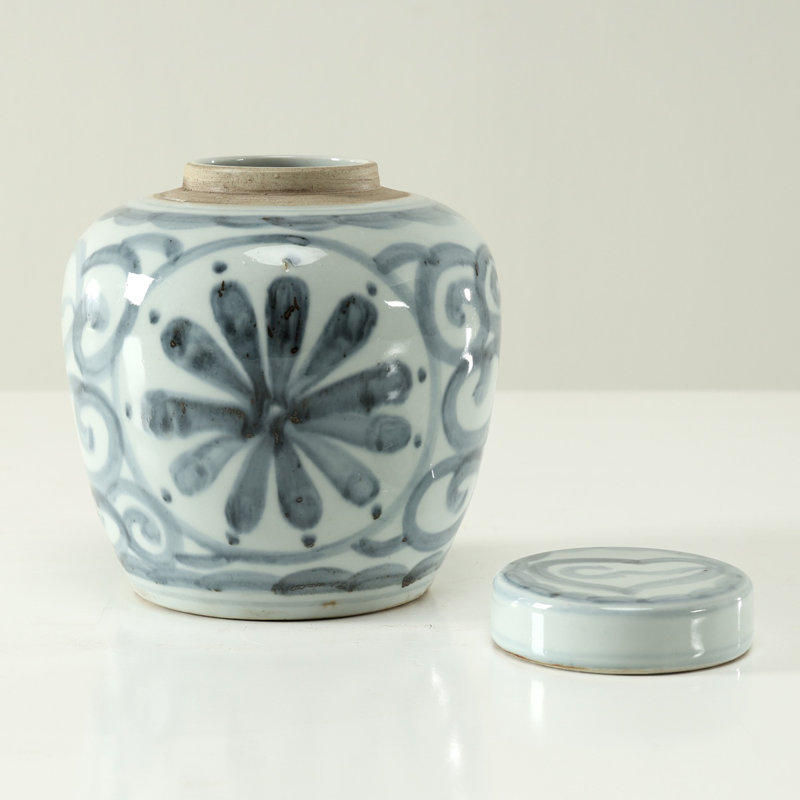 Approx.7 Inches Subtle Blue and White Round Jar with Floral Motif