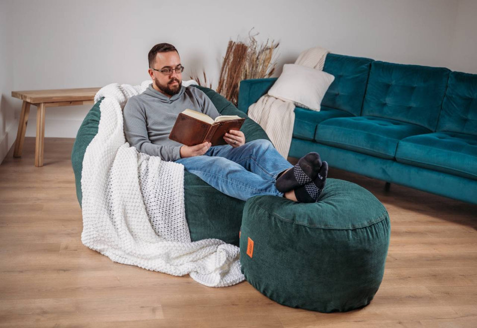 Upgrade spaces with the elegant Corduroy Rainforest beanbag and matching pouf.