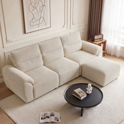 Canapé modulaire en L avec repose-pieds Boucle