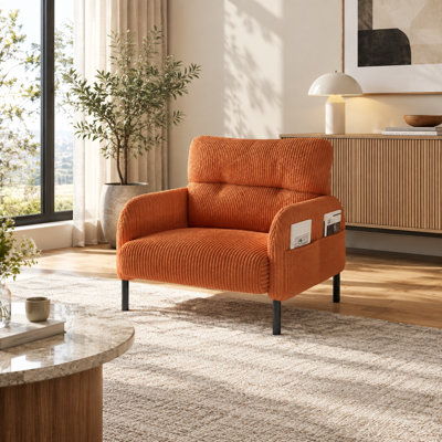 Fauteuil d'appoint en velours côtelé à assise large avec poches latérales