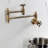 Kingston Brass Wendell Two-Handle 1-Hole Wall Mount Pot Filler Faucet with Knurled Handle-91118389
