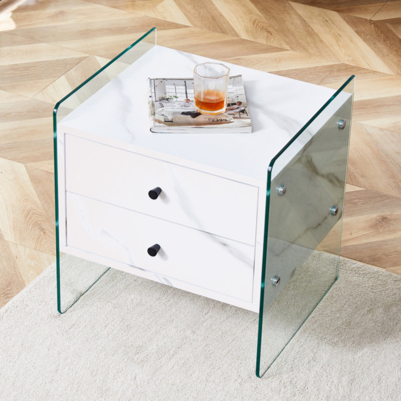 Double-Drawer Bedside Table.The Board Surface Is MDF With White Grain Sticker, And Both Sides Are Tempered Glass. The Design Is Simple And Elegant, With Excellent Storage Functions.W1512P285050