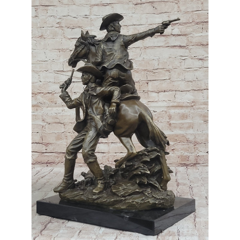 Statue de bronze d'un cowboy de l'Ouest