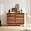 La commode double 6 tiroirs présente un design rétro et biseauté