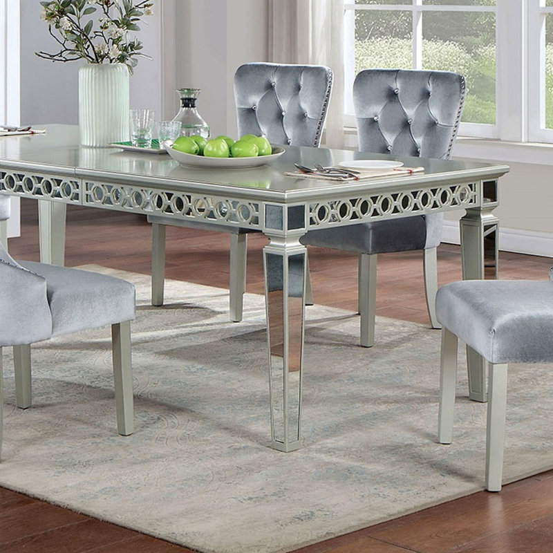 Table de salle à manger avec miroir à feuilles