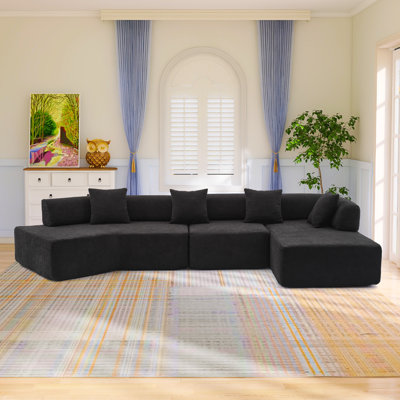 Temica 140" Boucle Low Back Curved Vacuumed Sectional
