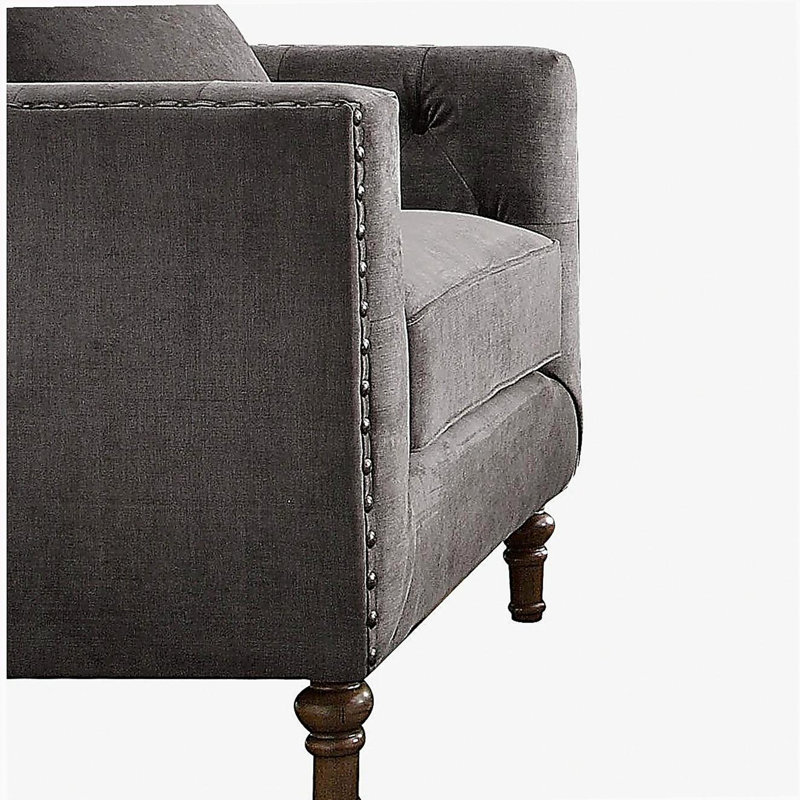 Chaise d'appoint grise avec coussin