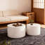 Table basse ronde blanche avec rangement caché