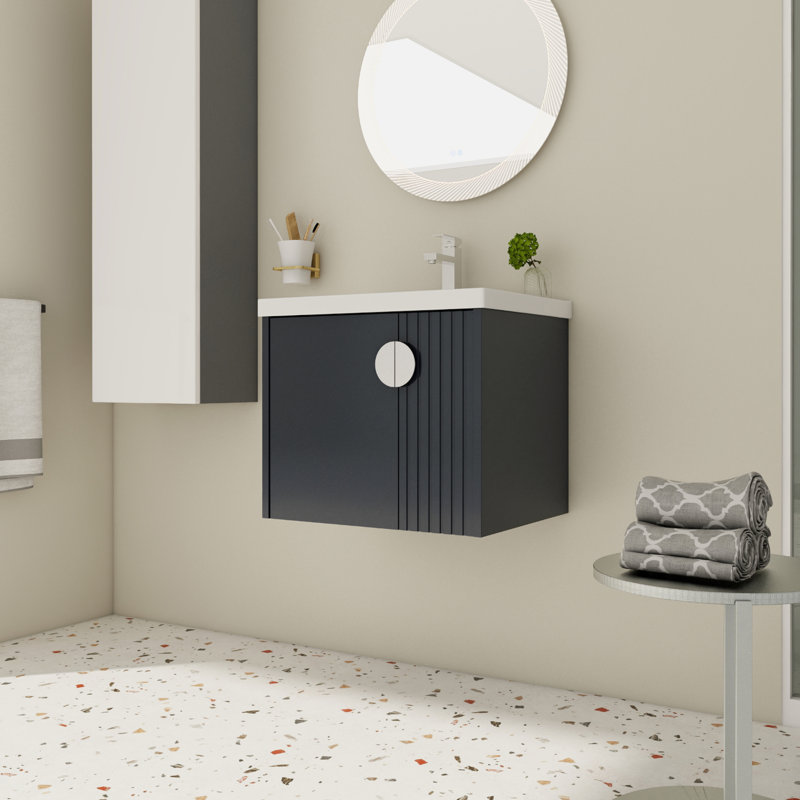 Meuble-lavabo de 24 po avec lavabo en céramique, fixation murale pour petits espaces, porte contemporaine à fermeture en douceur et poignées en métal, portes à fermeture en douceur