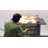 Propane Gas Fire Pit Table With Glass Wind Guard And An Open Basket-wave Patterned Wicker-947424578