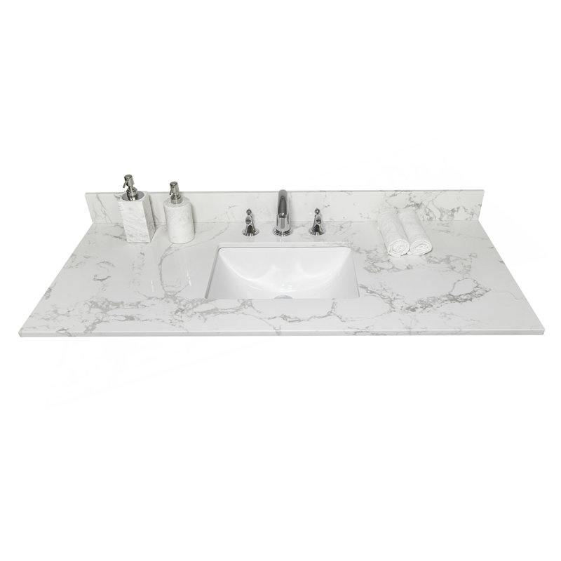 Dessus de meuble-lavabo en pierre Montary de couleur marbre blanc de Carrare avec lavabo rectangulaire encastré en céramique et 3 trous de robinet avec dosseret.
