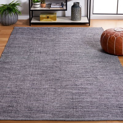 Tapis noir / ivoire en coton tissé à plat à la main Dallis