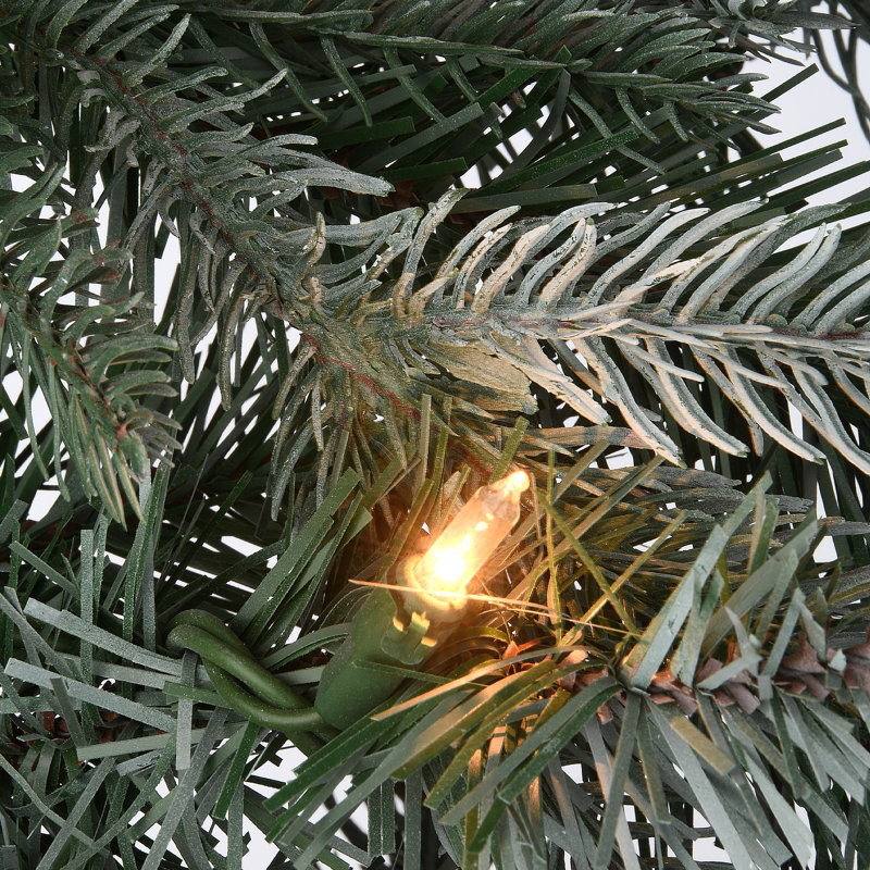 The Holiday Aisle® 9ft. Frosted Arctic Spruce Garland with Clear Lights