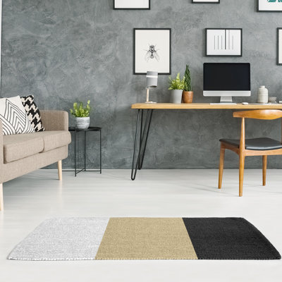 Tapis doré/noir