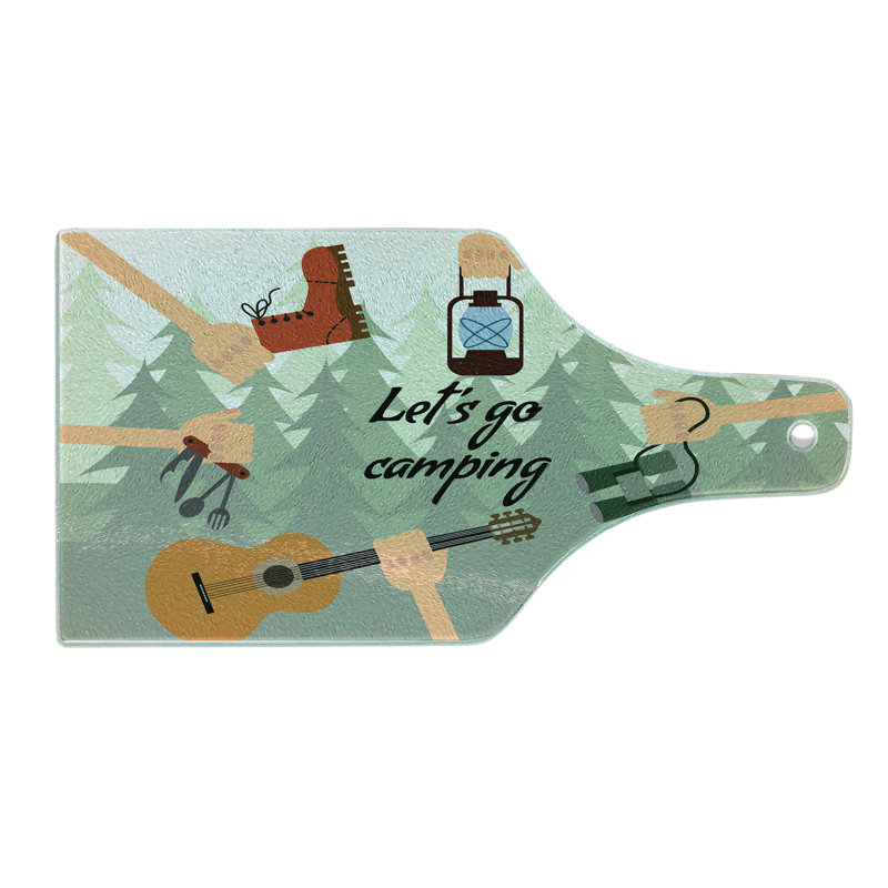 Planche à découper en verre East Urban Home Happy Camper