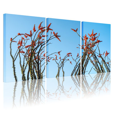 Ensemble de 3 tableaux sur toile tendue représentant des fleurs rouges, idéal pour la décoration du salon et de la chambre.