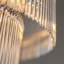 Geira 16lt Tiered Pendant light finished in Ant. Brass