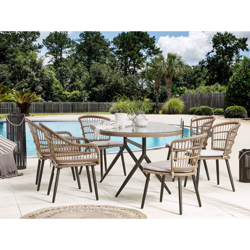 Bertille 6 - Person Wicker Patio Dining Set with Oval Table , Cushions Included