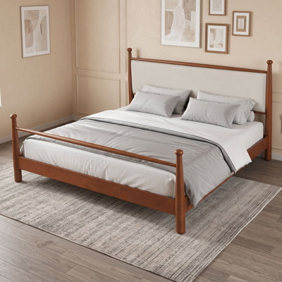 Lit plateforme en bois avec tête de lit tapissier