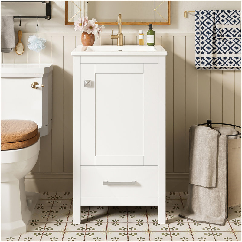 Meuble-lavabo moderne de 18 pouces avec lavabo en céramique, tiroirs à fermeture en douceur et organisateur de porte, tiroir de séparation et patins réglables en plastique - solution de rangement compacte pour les espaces étroits